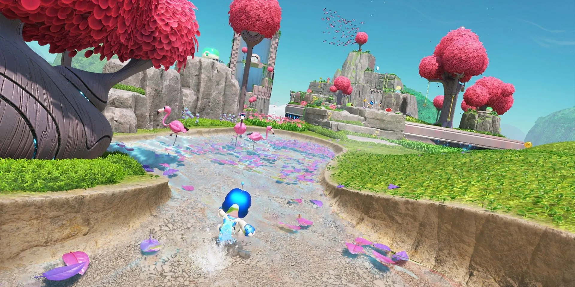 Astro Bot chạy trên một con đường đầy màu sắc với hình ảnh hồng hạc