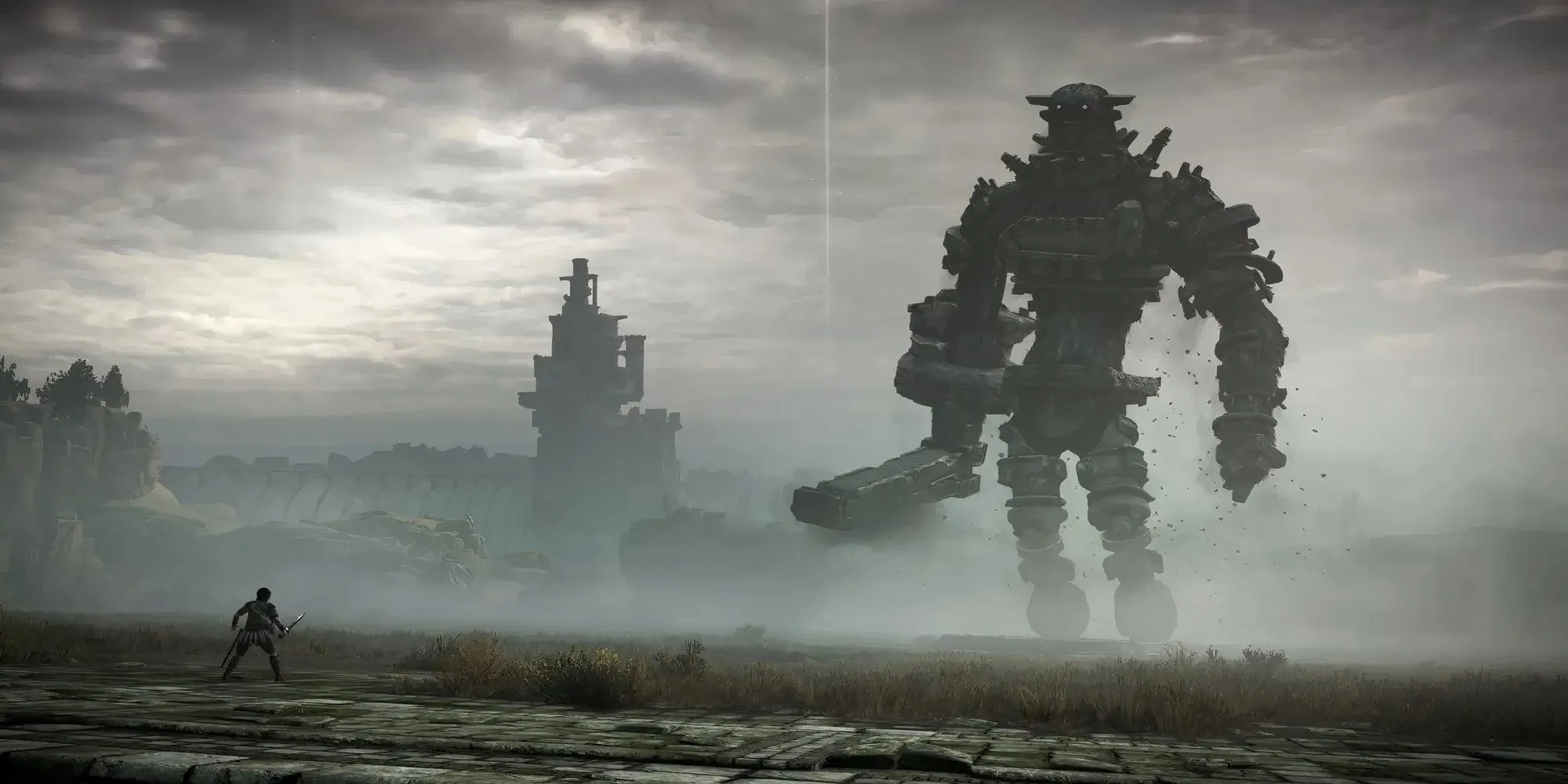Nhân vật chính Wander đối mặt với một trong những colossi hùng vĩ trong Shadow of the Colossus.