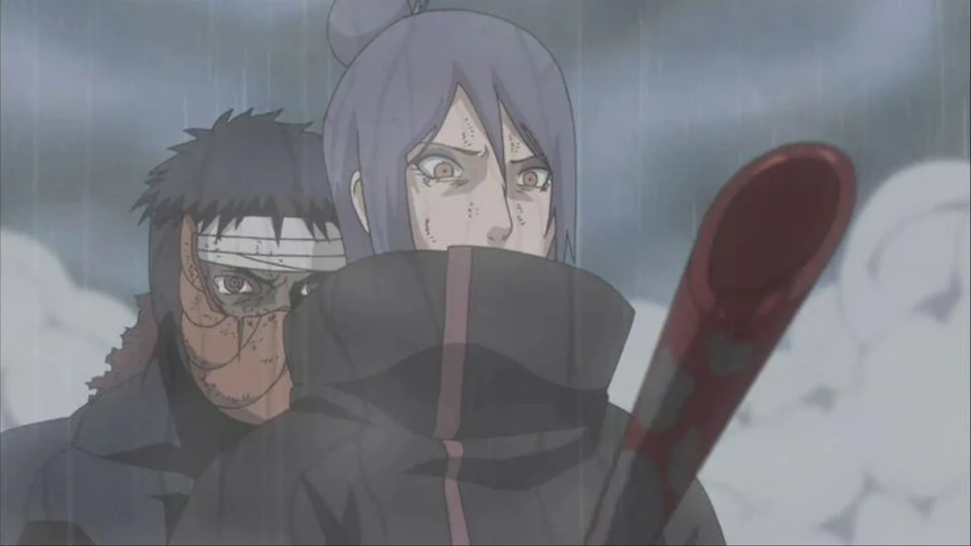 Obito đâm xuyên ngực Konan, kết liễu cô trong Naruto Shippuden.