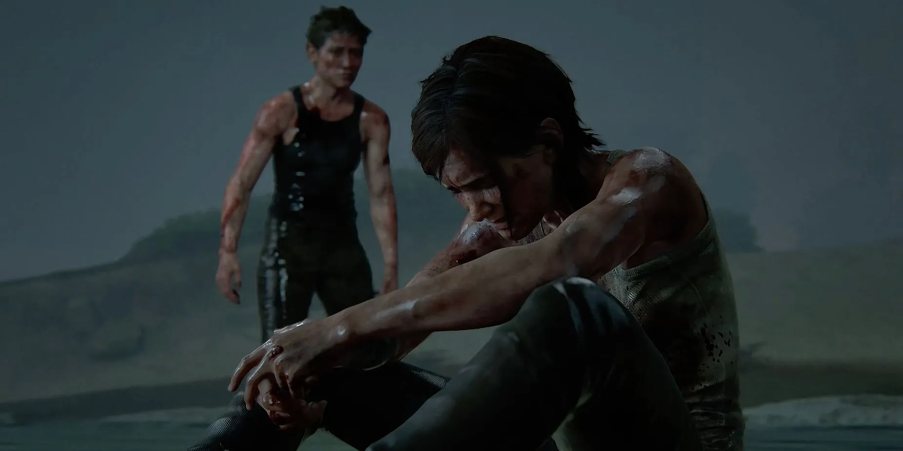 Abby nhìn Ellie đang ngồi gục trên nền đất trong trận đấu cuối The Last of Us Part 2