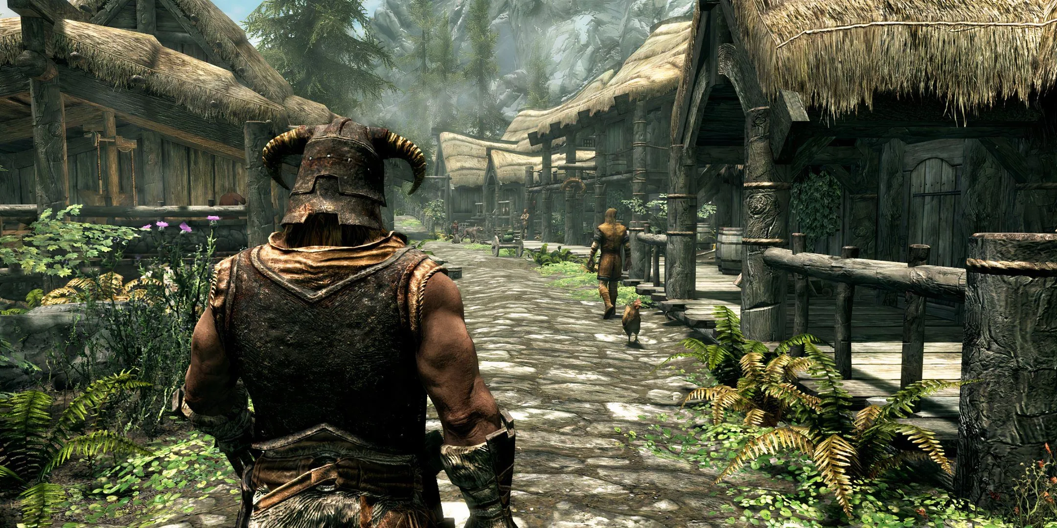 Nhân vật người chơi đang đi bộ qua một thị trấn trong Skyrim, một tựa game thế giới mở thường bị game thủ bỏ dở.