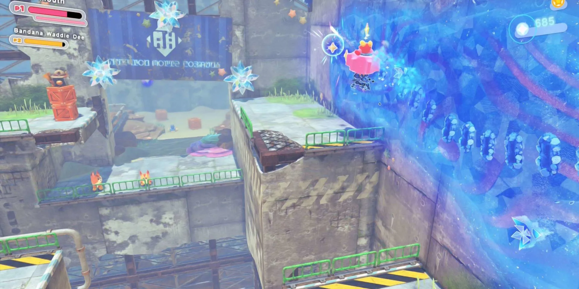 Kirby trong Mouthful Mode dạng bánh răng, di chuyển qua một khu vực mới trong DLC Star-Crossed World